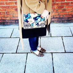 I fell in love with this handbag at my local consignment shop and waited over 3 months to buy it! It's my favorite handbag I own and I love to pair it with everything. Wearing it just makes me happy and the pattern reminds me of my hometown, Miami. I think of it as my little piece of the tropics while living in North Carolina #myhandbagstory